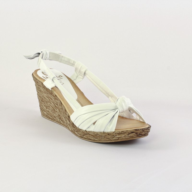 nu pieds talons compensés